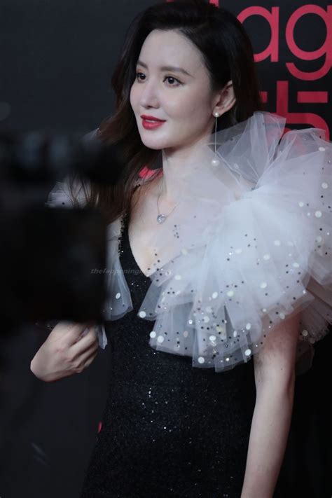 Zhang Meng Shows Her Cleavage At The Cosmo Event 12 Photos