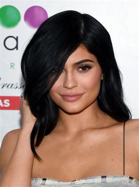 kylie jenner oozes sex appeal as a redhead in racy braless