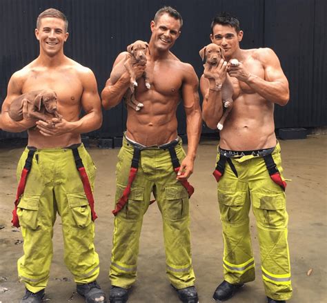 smokin hot firemen  posing  pups    charity