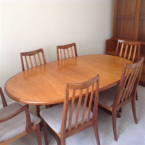 nathan teak dining table   chairs extends     chairs