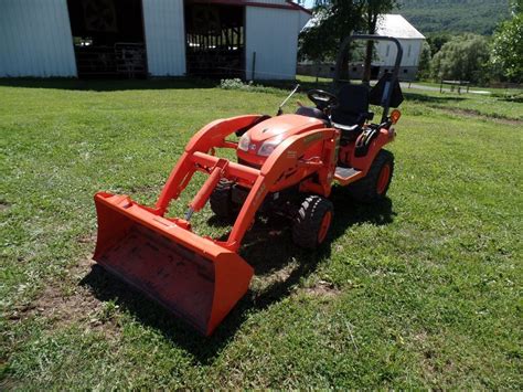 kubota bx compact tractor diesel  loader  hydro ag tires orops tractors compact