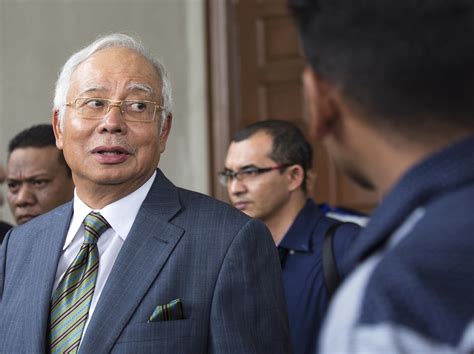 former malaysian prime minister charged with criminal breach of trust