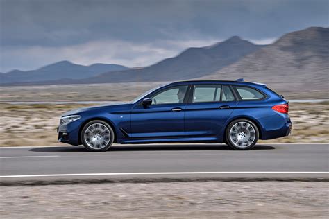 bmw  series touring  revealed   geneva debut