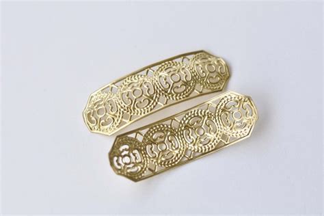 raw brass curved floral embellishments stamping set of 10