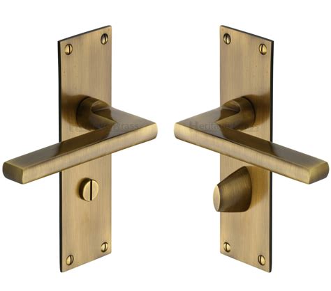 heritage brass trident  profile door handles  backplates antique brass tri  sold