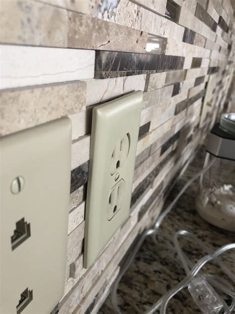 backsplash  outlets   tile   electrical