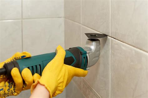 how to repair hairline crack in shower tile