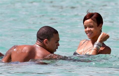 rihanna in rihanna and chris brown frolic on the beach in barbados