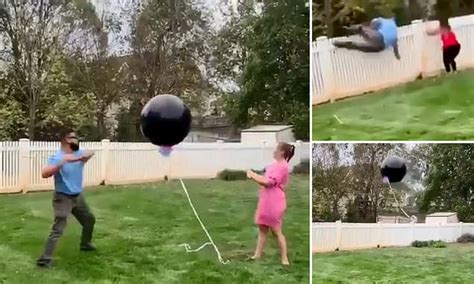 couple mocked for gender reveal fail which sees them trying to pop a balloon with a stick