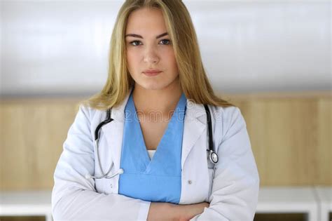 Doctor Woman At Work While Standing Straight In Hospital Or Clinic