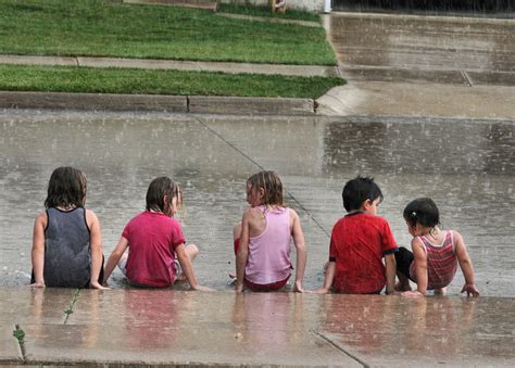 children playing  rain photo picture gallery