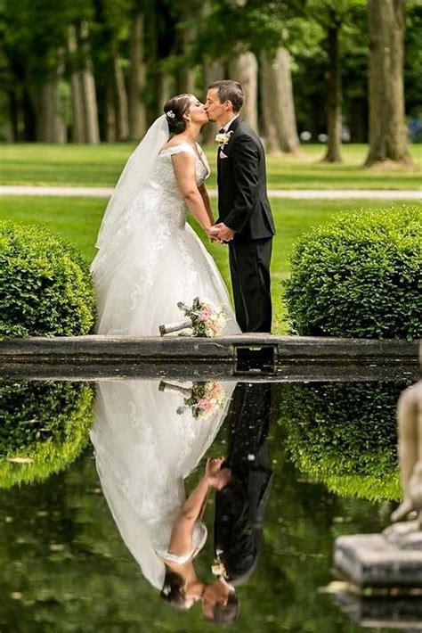 wedding photo shoot bride  groom reflection   water   garden