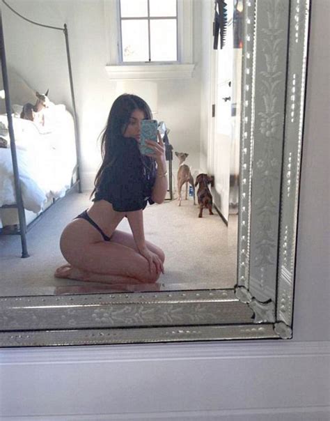 kylie jenner poses in a skimpy thong after she s pictured with very