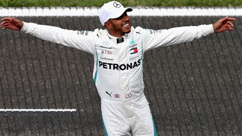 hamilton takes belgian gp pole after gruelling session