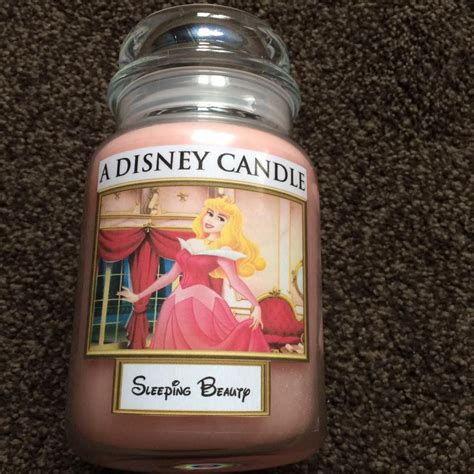 disney sleeping beauty themed yankee candle pink sands scent sleeping beauty princess sleeping