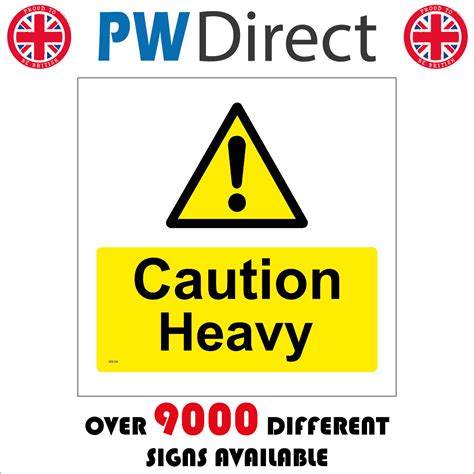 ws caution heavy sign lift  weight warning hazard health  safety  man  ebid united