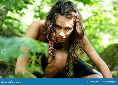 A Young And Wild Brunette Woman In A Forest Stock Image Image Of