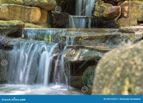 artificial waterfall stock photo image  peaceful pool