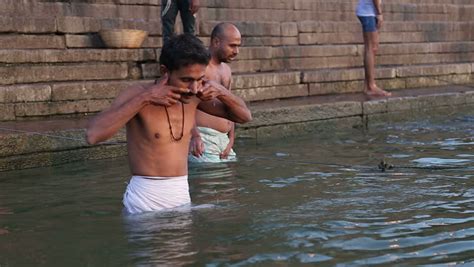 Varanasi India 22 February 2015 Men Bathing In The