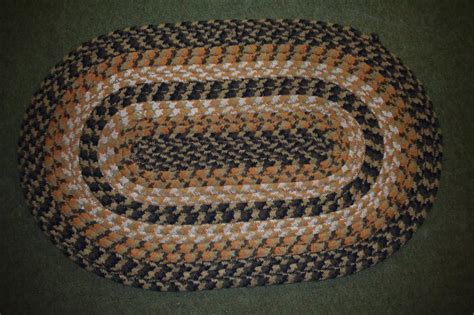 lot  small braided oval rugs