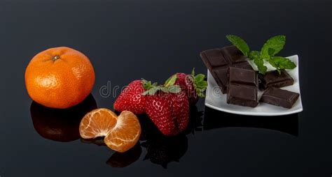 chocolate  fruits  darck background stock image image