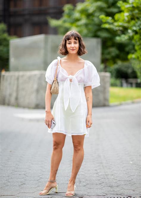 going braless in a white tie front dress sheer dress trend at