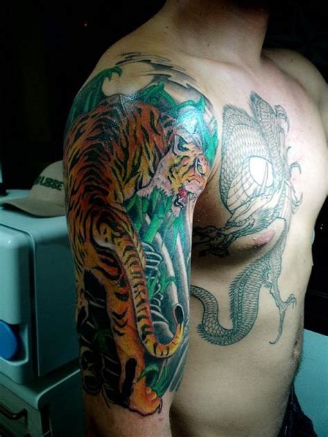 top tattoo designs chest dragon tattoo