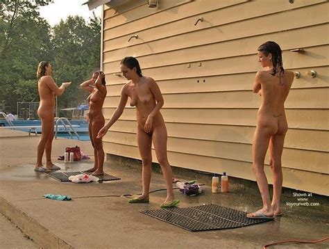 Four Nudes Enjoying The Outdoor Public Shower Nudeshots