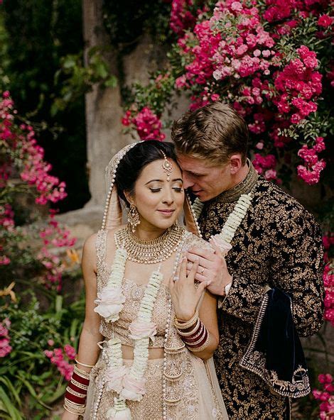 asian wedding in traditional country house garden with seasonal flowers
