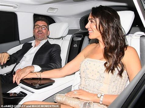 simon cowell and his glamorous fiancée lauren silverman hold hands