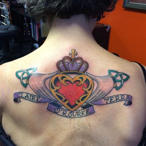 Old School Style Colored Upper Back Tattoo Of Hands