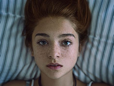 girl face with freckles high resolution photography