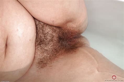 older lady christina x baring flabby stomach and hairy pussy