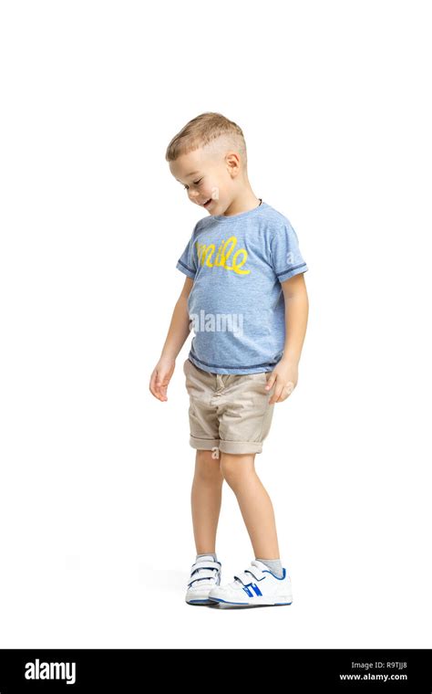 full length portrait  cute  kid boy  stylish clothes standing