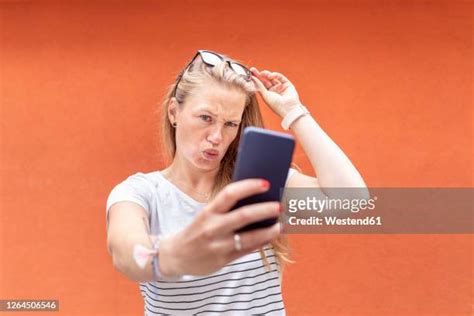 Kissy Face Selfie Photos And Premium High Res Pictures Getty Images