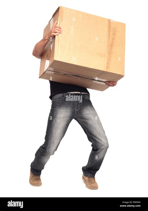 man carrying heavy box isolated  white  clipping path stock photo