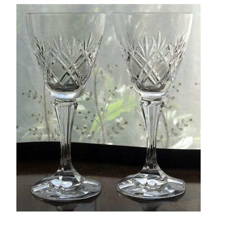 a vintage pair of good quality crystal cut glass wine glasses cut glass