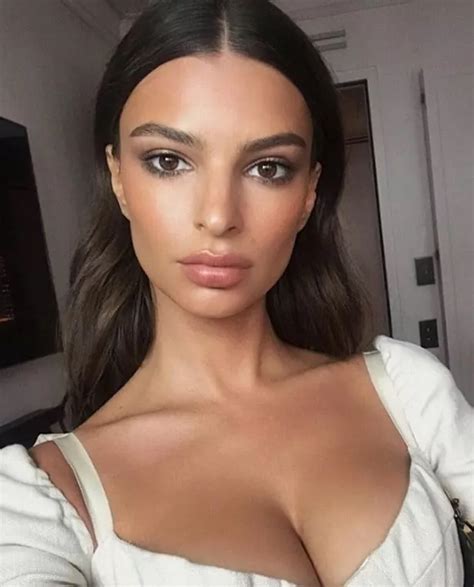 emily ratajkowski flashes her lithe legs and ample assets in a china