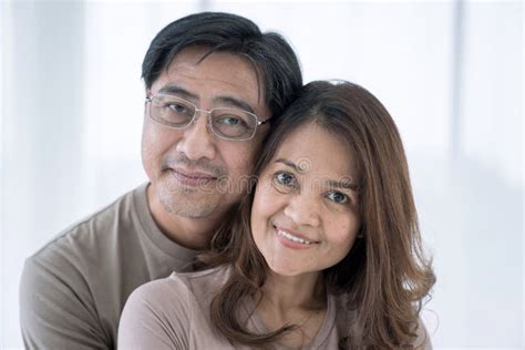 Happy Asian Senior Couple Stay Together At Home In Romantic Moment