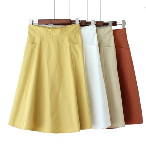 womens white cotton solid knee length skirt with pockets summer a line