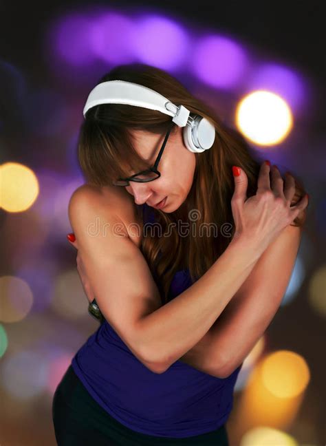 sensual woman lost in listening to music hugging herselff stock image image of blutooth