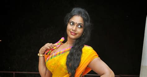 jayavani in yellow saree at andamaina maya audio launch