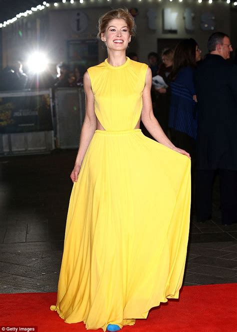 rosamund pike brightens up the winter evening in bright
