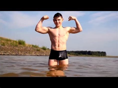 ripped teen bodybuilder andrey flexing   fun   water