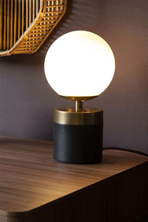 White Glass Globe Table Lamp With Black And Brass Base