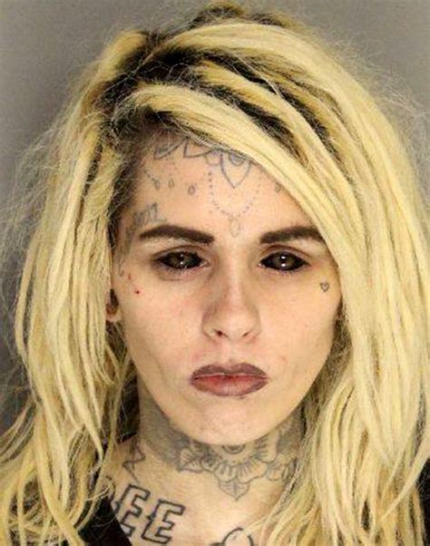 woman s police mugshot goes viral because she s got tattoos on her