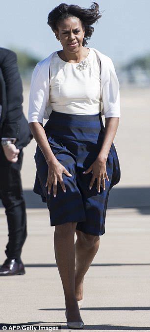 President Obama Saves Michelles Skirt From Blowing Up In The Wind