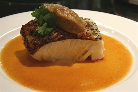 Roasted Chilean Sea Bass With Tomato And Lemon Grass Broth