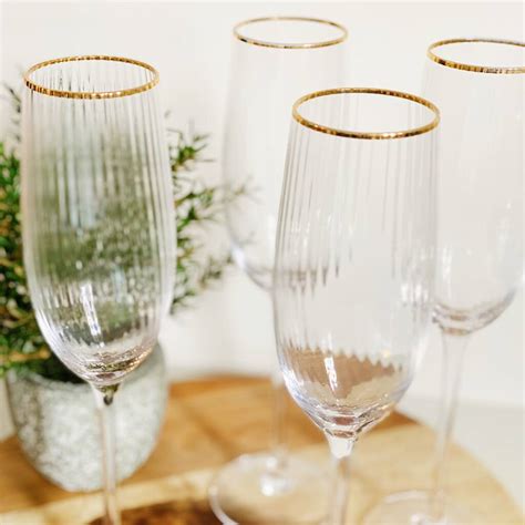 Gold Rim Ribbed Champagne Flute Glasses Set Of Four By Victoria And Co