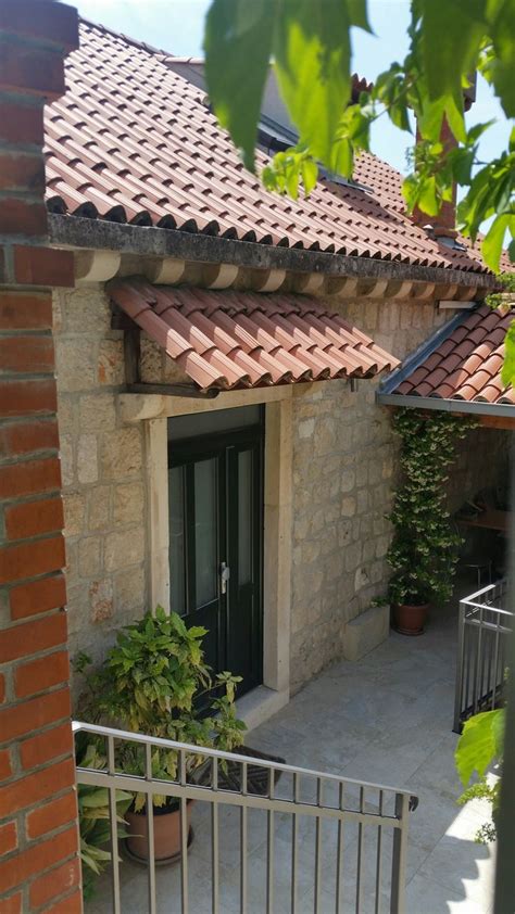 tile awning stone door frame house exterior house awnings house designs exterior